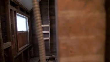 reconstruction of an old house. replacement of old wooden beams. High quality 4k footage