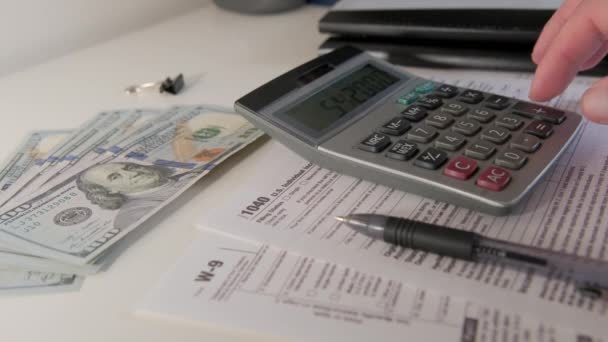 Calculate Amount Calculator 1040 Individual Tax Form Placed Desk American — стокове відео