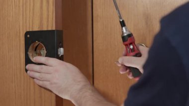 Repair of broken doors, replacement of door handles. High quality 4k footage