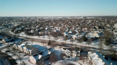 panoramic aerial view of a winter Naperville city with a private sector . High quality 4k footage