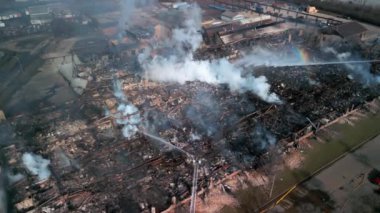 Aerial view of firemen fighting with fire near biulding . High quality 4k footage