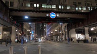 Cars Traffic in Chicago Magnificent Mile street on a Cloudy Winter Day. Vertical shot. CHICAGO, USA - JANUARY 3, 2023 . High quality 4k footage