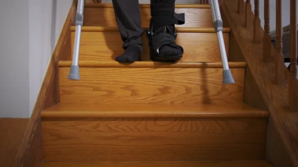 Man Broken Leg Black Fracture Boot Cast Trying Walk Crutches — Stock video