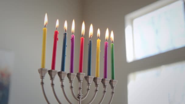 Colored Candles Lit Hanukkah Hanukkah Menorah Sun Rays Blurred Background — Stock Video