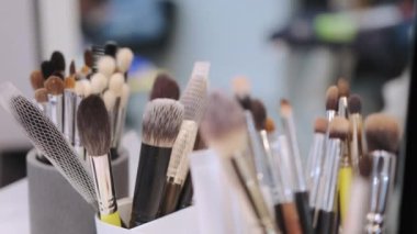 Close up of Professional make up brushes on the table. Move camera. High quality 4k footage