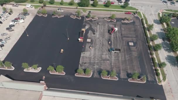 Group Construction Workers Laying Asphalt Concrete Parking Lot Roadway Aerial — Stock Video