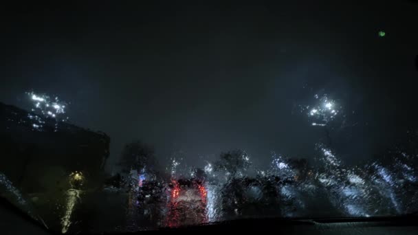 Pov View Heavy Rain Parking Lot Out Street Lights Night — стоковое видео