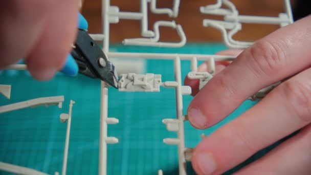 Close Footage Hands Man Assembler Plastic Model Table Hobby Time — Stock Video
