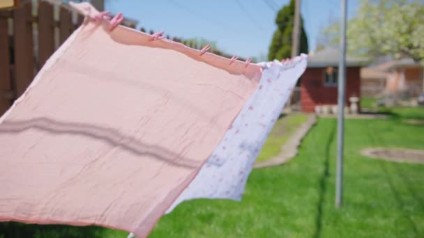 Drying Bed Sheets Outdoor Which Develops Wind Summer Time Wide — Stock video