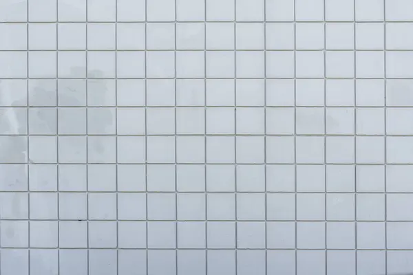 灰色のレンガの外壁の正方形のパターンの抽象的なイメージ ロイヤリティフリーのストック写真