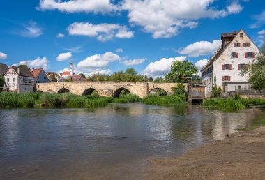 Historic bridge across the river Woernitz at the city Harburg (Bavaria, Germnay) clipart