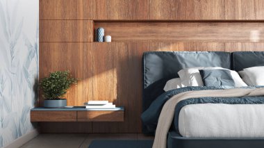 Cozy bedroom close up. Wooden headboard in blue and beige tones. Velvet bed, bedding, pillows and carpet. Modern minimalist interior design