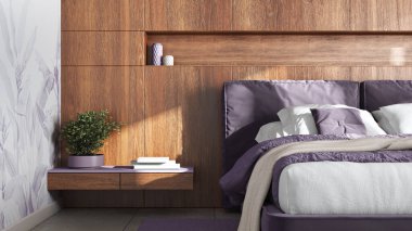 Cozy bedroom close up. Wooden headboard in purple and beige tones. Velvet bed, bedding, pillows and carpet. Modern minimalist interior design