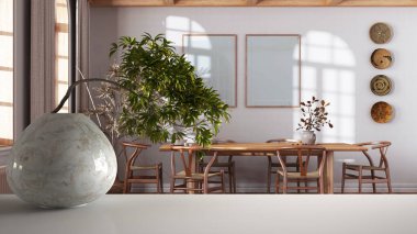 White mat table shelf with round marble vase and potted bonsai, green leaves, over farmhouse dining room, japandi interior design, zen clean architecture concept