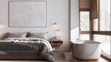 Blurred background, minimalist wooden bedroom with bathtub close up. Double bed, parquet floor and wallpaper. Japandi interior design