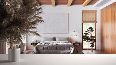 White table top or shelf with straws, dry plants, ornament, ears, sheaf, branch in vase, over japandi bedroom with double bed and bathtub, modern interior design
