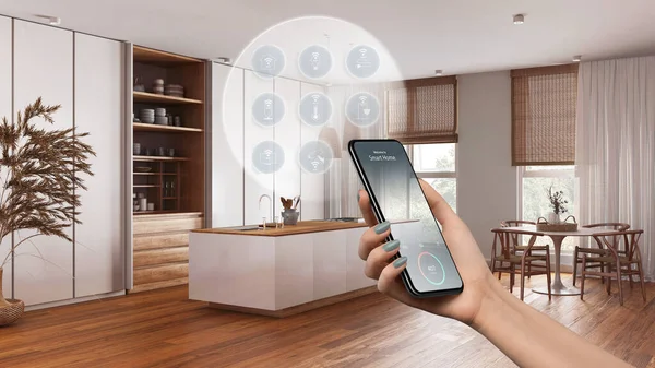 Smart home technology interface on phone app, augmented reality, internet of things, interior design of kitchen with connected objects, woman hand holding remote control device