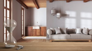 Ahşap masa, masa ya da raf kristal modern kum saati ile birlikte. Çiftlik evi oturma odası ve mutfağı, iç tasarım, fotokopi alanı üzerindeki geri sayım zamanının geçişini ölçüyor.