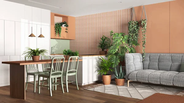 Urban jungle, kitchen and living room in white and orange tones. Dining table, sofa and houseplants. Home garden interior design. Biophilia concept