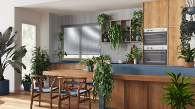 Ada ve sandalyeli beyaz ve mavi tonlarda modern ahşap mutfak. Biyofilik konsept, birçok ev bitkisi. Kentsel orman iç tasarımı