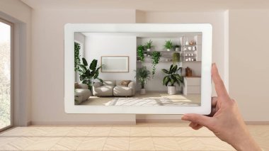 Gelişmiş gerçeklik kavramı. Boş ahşap iç mekan, orman mutfağı ve oturma odasındaki mobilya ve tasarım ürünlerini simüle etmek için kullanılan AR uygulamalı el bilgisayarı tableti.