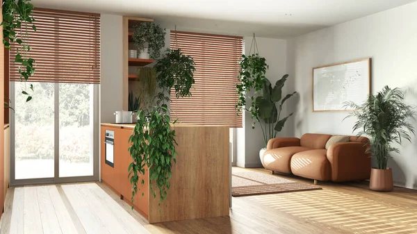 Modern wooden kitchen and living room in orange tones with island, sofa, window and appliances. Biophilic concept, many houseplants. Urban jungle interior design