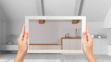 Gelişmiş gerçeklik kavramı. Tamamlanmamış beyaz arka planda mobilya ve tasarım ürünleri simülasyonu için kullanılan AR uygulamalı tablet, japandi minimal mutfak