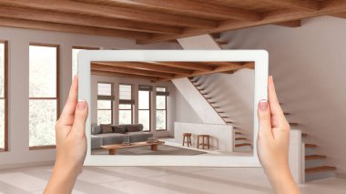 Gelişmiş gerçeklik kavramı. Boş ahşap iç mekanlarda mobilya ve tasarım ürünlerini canlandırmak için kullanılan AR uygulamalı el bilgisayarı tableti, merdiveni olan minimal oturma odası