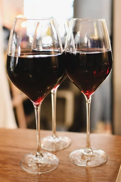 Glasses with red French wine in a restaurant