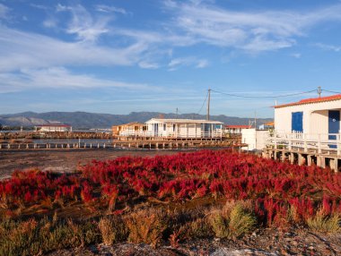 Authentic Fishing houses on the water in the village of Turlida, Mesolongi, Greece clipart