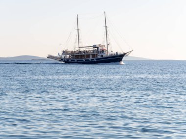 Yunanistan 'ın Mykonos adasında gün batımı yolcu gemisi turu