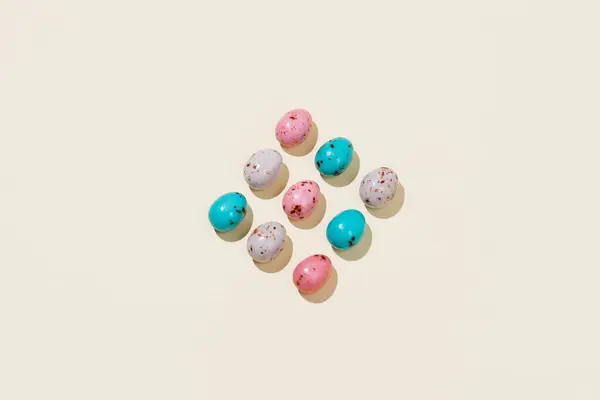 Patrón Huevos Pascua Chocolate Colores Rosa Beige Azul Sobre Fondo Imagen De Stock