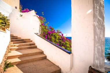 Idyllic stairs to beach in Nerja panoramic view, Andalusia region of Spain