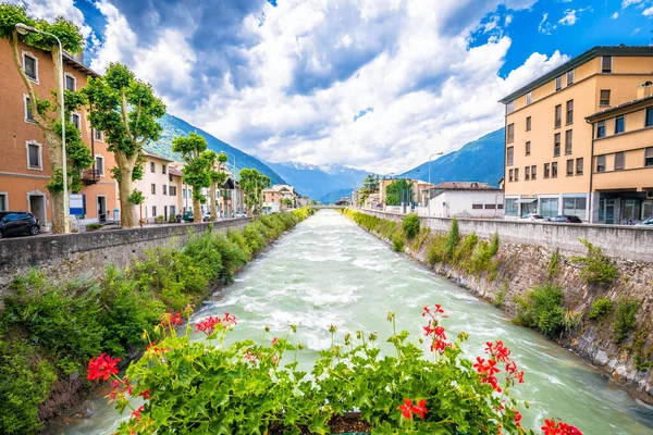 stock image Town of Tirano and Adda river waterfront view, Province of Sondrio, Alps of Italy