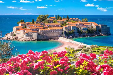 Sveti Stefan historic island village and beach view, archipelago of Montenegro  clipart