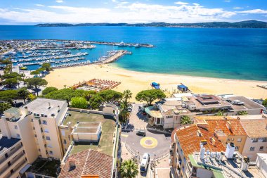 Town of Sainte Maxime beach and waterfront aerial panoramic view, south of France riviera clipart