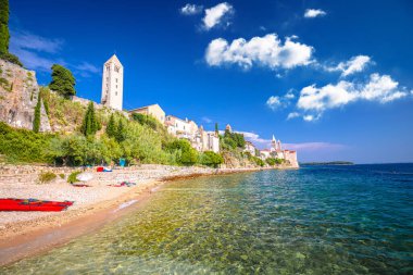 Historic town of Rab towers and beach walkway view, archipelago of Croatia, Dalmatia clipart