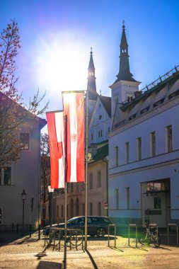 Town of Leoben colorful street and church sunset view, Styria state of Austria clipart