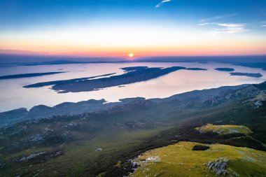 Panoramic view of Adriatic archipelago at sunset, Rab island, view from Alan on Velebit mountain, Croatia clipart