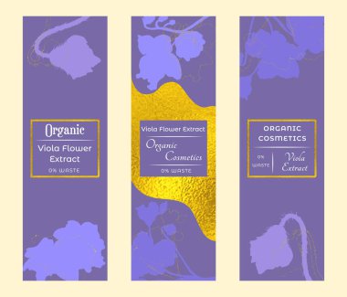 Group of narrow vertical banners for herbal cosmetics, perfumes, or other products. Banners decorated with silhouettes of violets that are placed above and below, golden outlines and textures. clipart