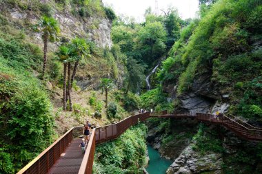 BELLANO, ITALY - AUGUST 12, 2022: Waterfalls and the gorges of a natural canyon, Orrido di BellanoLombardy, Italy clipart