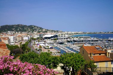 CANNES, FRANCE - JUNE 17, 2022: Cannes cityscape with port and yachts moored, France