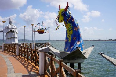 ARACAJU, BRAZIL - OCTOBER 10, 2024: Boi de Reis Reisado statue in Largo da Gente Sergipana promenade in Aracaju, Sergipe, Brazil clipart