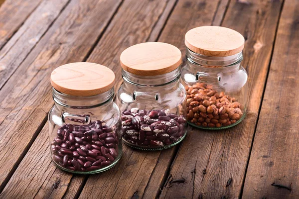 Red Beans Transparent Glass Jar Wooden Background Stock Photo