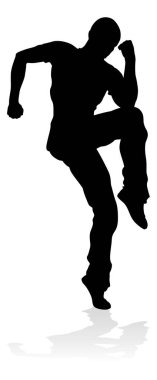 Siluet bir erkek sokak dans hip hop dansçısı