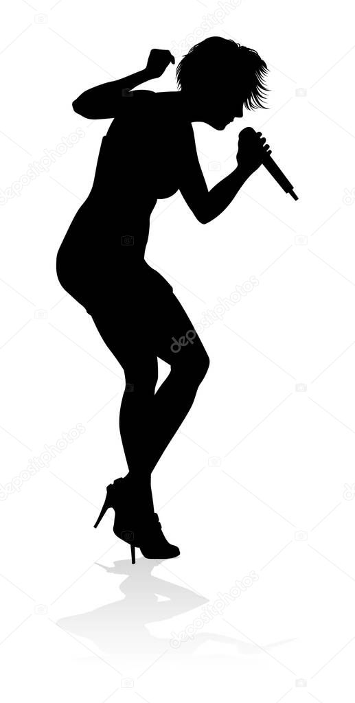 A woman singer pop, country music, rock star or even hiphop rapper artist vocalist singing in silhouette