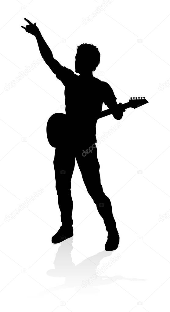 A guitarist musician in detailed silhouette playing his guitar musical instrument.