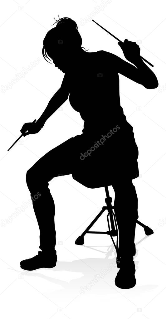 A drummer musician drumming drums in detailed silhouette