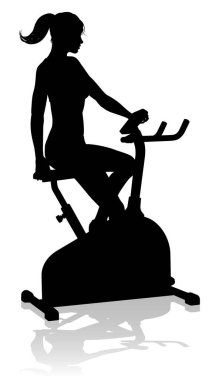 A woman in silhouette using a stationary exercise spin bike piece of gym equipment fitness machine clipart