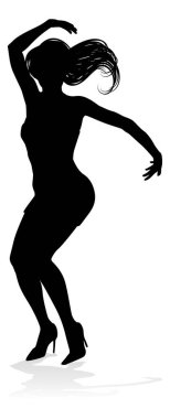 Siluet içinde dans eden bir kadın dansçı.